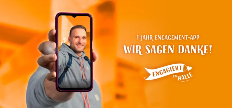 Ein Mann h&auml;lt ein Handy hoch, daneben steht der Text 'Wir sagen Danke'